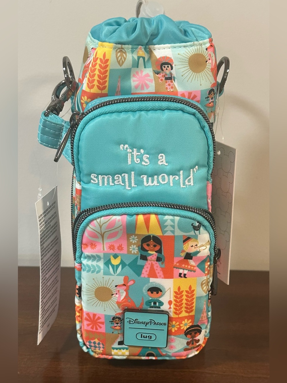*NEW TAGS* Disney Parks Lug Huggie Bag Water Bottle Holder It’s A Small World